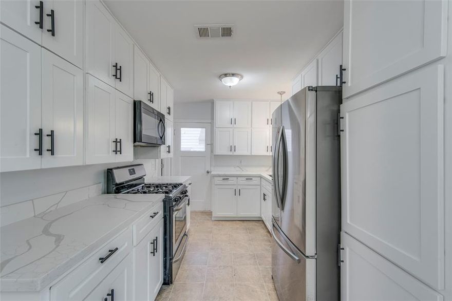 Charming 3-bedroom, 1-bathroom and 1 car carport home featuring beautiful wood floors throughout! This 1,081 square foot gem built in 1955 sits on a comfortable .2 acre lot in Hillsboro. A convenient location in the A-rated Hillsboro School District makes this an ideal choice for families, while the manageable size and classic features appeal to first-time buyers or those looking to downsize without sacrificing quality or style. The home perfectly blends classic character with modern updates, showcasing stunning quartz countertops, updated appliances with gas stove-oven, dishwasher and refrigerator is included with the sale. The warm wood flooring creates a welcoming atmosphere and flows seamlessly through the living areas, offering easy maintenance. Step outside to discover a large fenced backyard, perfect for pets, children's play, gardening, or outdoor entertaining in complete security. This well-maintained home offers comfortable single-story living with plenty of charm and character.  Don't miss the opportunity to own this delightful property in a top-rated school district!