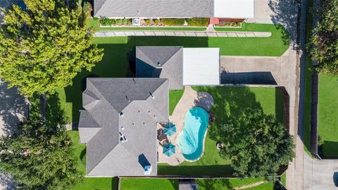 Photo of 4010 Bluffpoint Road, Rowlett, TX 75088 (MLS # 21180488)