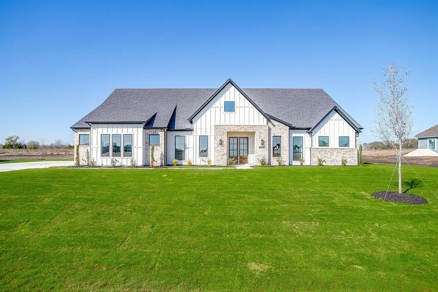 Tucked on a full acre in Waxahachie, this four-bedroom, three-bath retreat brings the charm of country living without sacrificing connection. Wide open skies, spacious interiors, and room to roam make it feel like your own piece of Texas—just 30 minutes from the energy of downtown Dallas. It’s where front porch mornings meet city-close convenience, and where your next chapter feels wide open.