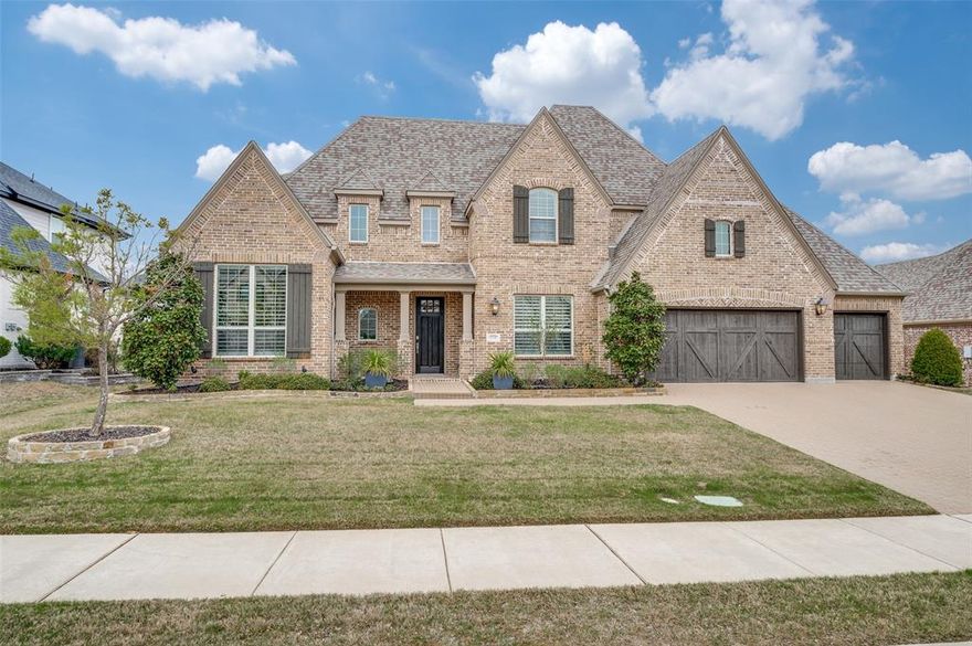 Located in the highly sought-after Mustang Lakes in exemplary Prosper ISD, this stunning residence offers luxurious living on a great scale. Boasting an impressive 4,393 sqft, this meticulously maintained home features 5 spacious bedrooms & 4.5 elegantly appointed bathrooms, providing ample space for comfortable living & entertaining. Enter & be greeted by sophisticated details, including a dining room with a striking decorative feature wall & designer chandeliers in both the entrance & formal dining areas. Natural light floods the home, enhanced by stylish wooden window shutters & remote control electric blinds throughout. The gourmet kitchen features beautiful Quartz countertops & chic decorative pendant lighting. This culinary haven seamlessly flows into the main living areas, perfect for hosting gatherings. Extend your living outdoors with the spacious, covered patio, a paradise complete with built-in stainless steel cabinets & a KitchenAid BBQ and convenient gas connection. The expansive 80+ foot lot is beautifully landscaped, featuring a charming cobblestone path, mature trees & thoughtfully designed front & back yards. Car enthusiasts & those needing extra storage will appreciate the 4-car garage, complete with a durable epoxy floor & practical wire shelving. Upstairs, discover a haven for recreation & study. The playroom & game room have been thoughtfully updated with built-in computer desks in dedicated study areas. The luxurious primary suite offers a serene retreat, & the ensuite bathroom boasts a sleek frameless shower door. Added modern conveniences include power over Ethernet WiFi access points ceiling mounted for seamless connectivity & custom drawer & shelving in the master walk-in closet. Enjoy the exceptional lifestyle Mustang Lakes has to offer, & less than a 5-minute walk to the community clubhouse & its fantastic amenities. Don't miss the opportunity to own this exceptional property in a premier location!