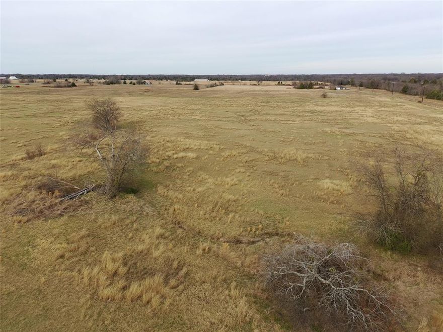 10 acres of Beautiful ready to build country land minutes from Jim Chapman Lake and Sulphur Springs. Water and Electric available at the street. No Restrictions!  All the peace of the countryside but close enough to restaurants and stores! Build your home and sit out at night and see all stars!