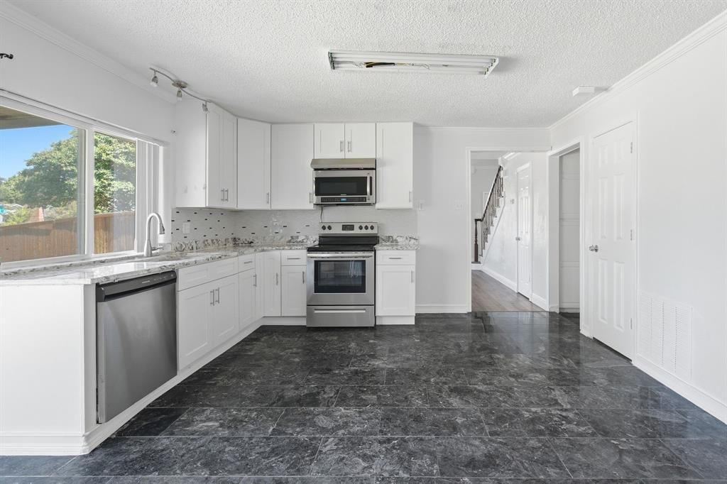 Photo of 2930 Lancer Lane, Garland, TX 75044 (MLS # 21328934)