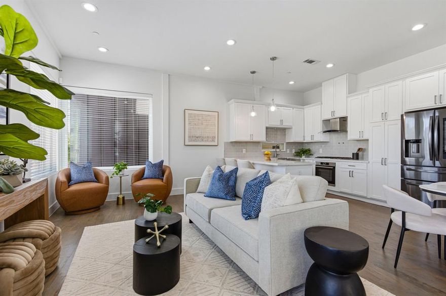 This updated townhome checks all the boxes with an unbeatable location walkable to all Henderson, Fitzhugh and Greenville Ave restaurants and nightlife. A rare *CORNER UNIT* with great curb appeal and a *PRIVATE ROOFTOP DECK* with turf perfect for entertaining. The second floor is light and bright with an open concept kitchen and living space with lots of windows, high ceilings and a balcony. The chef’s kitchen features high-end finishes, upgraded appliances, a roomy pantry, and a large island for entertaining. The living and dining areas boast tall ceilings and access to a balcony, perfect for outdoor living. The primary suite is a true retreat, with a generous bedroom, a large walk in closet and a luxurious ensuite with dual sinks. Upstairs, you have a large flex space great for second living area, home office or gym! Attached is your private rooftop patio with downtown views, an ideal spot for relaxing or entertaining.