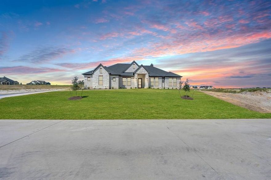 $10,000 buyer's concession for an acceptable full-price contract by 12-30-2025. NO CITY TAXES – Your Dream Home Awaits!

This brand-new Texas Heritage home, located in the heart of Ellis County, is move-in ready and waiting for you! Nestled in a beautiful new neighborhood surrounded by peaceful rolling farmland, this stunning residence masterfully blends modern comfort with timeless country charm.

Step inside to an open-concept floor plan with a split-bedroom design, featuring 4 spacious bedrooms and a private office—perfect for remote work or versatile living options. The gourmet kitchen stands out with sleek granite countertops, decorative lighting, and impeccable craftsmanship throughout, making it ideal for both cooking and entertaining. Set on a full 1-acre lot, there’s plenty of space to bring your outdoor dreams to life—whether that’s adding a sparkling pool, creating a garden retreat, or setting up a play space for the family. Enjoy peaceful evenings on the covered back porch, soaking in the serene views of your expansive surroundings. This home also features a cozy fireplace, perfect for warming up on chilly winter days. Located in the sought-after Waxahachie ISD, you’re just a short drive from the historic downtown Waxahachie, known for its charming shops, dining, and entertainment options. Plus, with NO CITY TAXES, you get all the benefits of country living without the added burden.
