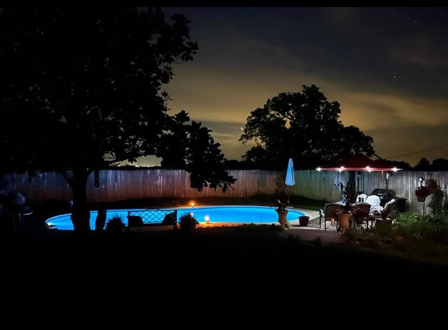 Single Story 3-4 Bedroom, 2 Bath home with a 9' deep swimming pool on a 1 acre lot!  Bonus Room can be used as a large 4th bedroom or 2nd living area.  Upgraded Laminate Flooring throughout the home, Ceramic Tile in the kitchen and bathrooms.  New HVAC 2024.  Circle Drive, 2-Car Carport, RV hook-up.  Large beautiful oak trees.  The large lot offers privacy, space for outdoor activities, and ample room to add your personal touch. Whether you’re hosting friends by the pool or enjoying the serene surroundings, there is something for everyone!