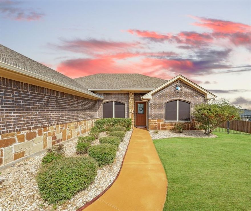 Nearly half an acre corner lot, extra side yard access, and an outdoor setup that truly delivers. This beautifully maintained home features a large back patio, outdoor kitchen, automatic roll-down sun shades, and fans for year round comfort. Fully fenced and exceptionally well kept, this one offers the kind of space and features that stand out.