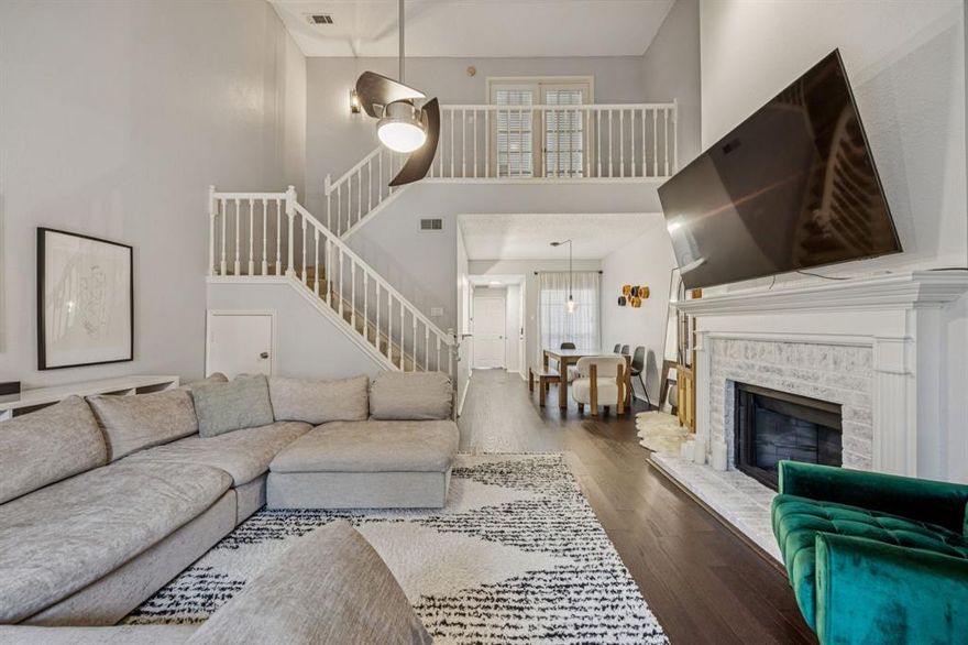 Ask about assistance with HOA dues and interest rate buy-down! Tucked inside a gated, tree-lined community, this charming two-story retreat offers the perfect blend of comfort, style, and convenience. With 2 bedrooms and 2 full baths, the flexible layout features a spacious bedroom on each level—ideal for dual primary suites, guests, or a private home office setup.

The inviting living area centers around a cozy fireplace, while the generous dining space is perfect for hosting dinner parties or casual nights in. Step outside to your private balcony, complete with additional storage, and enjoy peaceful views from one of the most desirable spots in the community—right in the heart of the complex and surrounded by mature trees.

Thoughtfully updated throughout, this home features new flooring and carpet, updated kitchen appliances (refrigerator, microwave, stove, and oven), modern fans and fixtures, refreshed bathrooms and kitchen, and a smart AC and heating control system for ultimate comfort and efficiency.

Residents enjoy access to resort-style amenities including a clubhouse, picnic area, and fitness center. Plus, you’ll have your own covered parking space, with additional guest parking nearby.

Conveniently located with quick access to I-75, 635, and the Tollway, this move-in ready home makes commuting and exploring the city effortless.