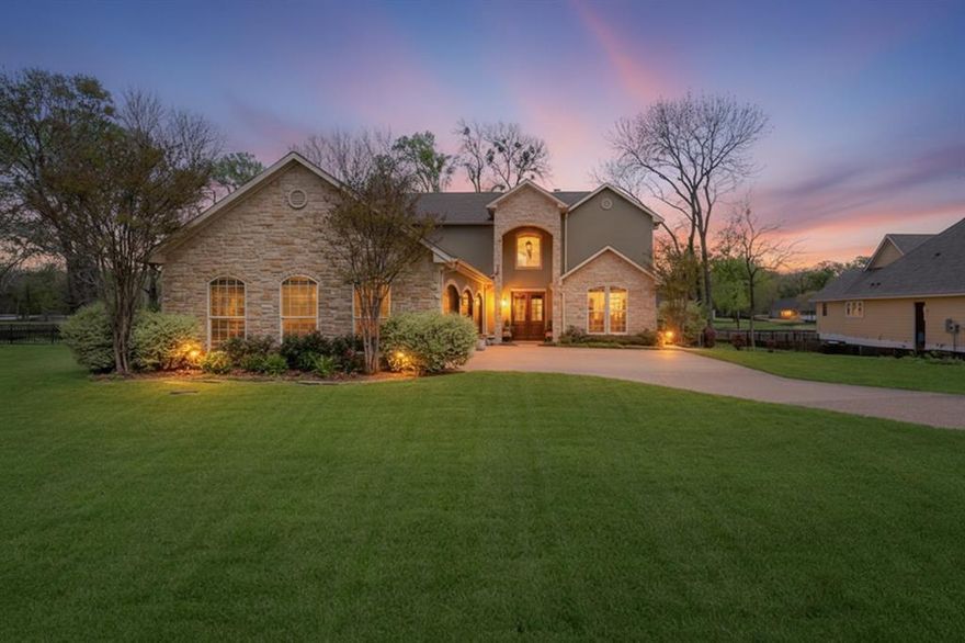 Nestled on 1.01 acres in the desirable Shores subdivision on Richland Chambers Lake, this stunning 4-bedroom, 2.1-bath lake house offers the perfect blend of comfort, space, and breathtaking waterfront views. The first floor welcomes you with an open floor plan designed for both everyday living and entertaining. The spacious kitchen features a large island, double ovens, abundant cabinetry, and pantry. Just off the kitchen is a large laundry room and convenient half bath. The living room is a showstopper with vaulted ceilings, a dramatic stone fireplace, and floor-to-ceiling windows that capture incredible lake views. The primary suite is located on the main level and offers a peaceful retreat with private access to the covered outdoor patio. The ensuite bath includes separate vanities, separate shower, and his-and-hers walk-in closets for ample storage. Upstairs, you'll find a loft-style family room that overlooks the main living area, creating a bright and open feel. This level also includes three additional bedrooms and a full bath, providing plenty of space for family or guests. Step outside to enjoy a backyard designed for lakefront living and entertaining. The property features two separate covered patios, one complete with its own fireplace, perfect for relaxing evenings. The inground pool with slide adds fun for all ages. The backyard is enclosed with wrought iron fencing and includes a private boat ramp for easy lake access. The .505-acre grassy yard is its own separate parcel, offering added flexibility and potential for future development, such as a second residence or a large RV or boat garage. Additional highlights include a three-car garage and location within a gated community that offers exceptional amenities, including a marina, community pool, and clubhouse with fitness center. This incredible lakefront property combines luxury, recreation, and privacy—making it the perfect place to enjoy everything Richland Chambers Lake has to offer.