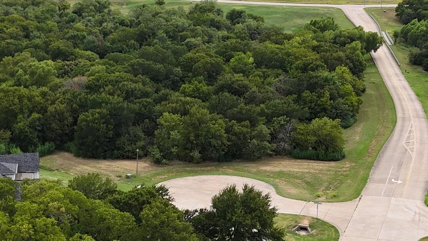 Build your dream home on this serene 3+ acre lot in the prestigious community of Lake Ridge. Bring your own builder and create a custom home that fits your vision. Lake Ridge has been recognized as one of the most popular neighborhoods in the country, offering rolling hills, natural beauty, and an unbeatable lifestyle. Conveniently located near Joe Pool Lake, golf, parks, and shopping—this is a rare opportunity to own in one of the area’s most desirable communities.