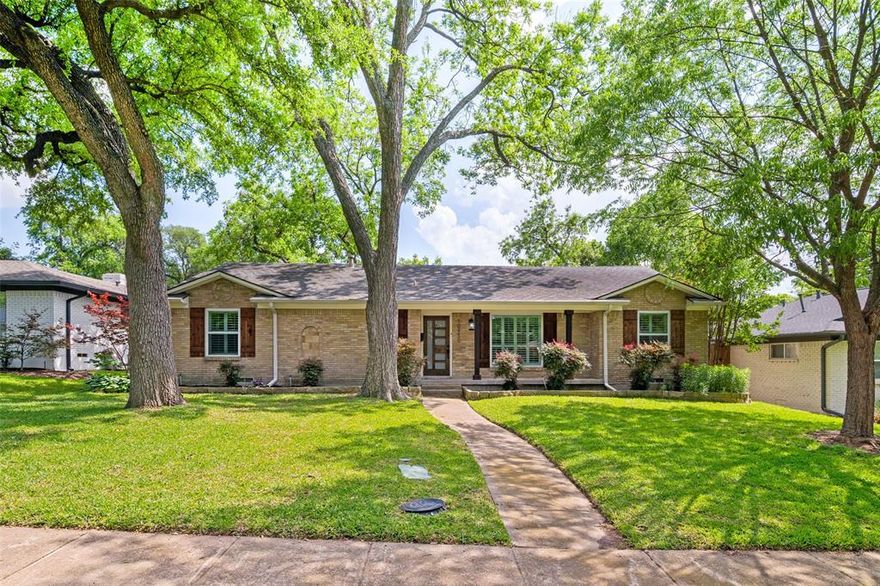 This stunning Lochwood home offers a modern, open-concept floor plan enhanced by thoughtful designer finishes throughout. Packed full of updates, the layout includes both formal living and dining areas, perfect for entertaining or everyday living. Rich hardwood floors run throughout the home, adding warmth and elegance. The fully remodeled kitchen opens seamlessly to the main living area and is equipped with stainless steel appliances, granite countertops, and a built-in wine cooler and bar area—ideal for hosting friends and family. Step outside to a beautifully designed backyard retreat, complete with a 400-sq ft pavilion and cedar deck, creating the perfect outdoor living space. Conveniently located in the heart of Lochwood, this home also offers flexibility with an optional fourth bedroom that could easily be used as a home office. Located just minutes from White Rock Lake, the Dallas Arboretum, and the vibrant dining and culture of East Dallas. This is truly a must-see!