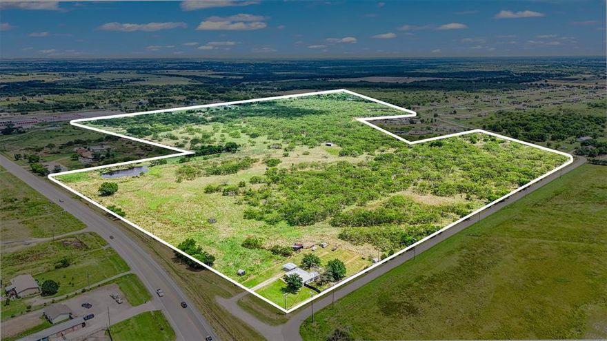 Rare offering of 105 pristine acres with prime Highway 205 frontage in Kaufman County's fastest-growing corridor. This strategically positioned tract offers unparalleled development potential just 30 minutes from Dallas in the rapidly expanding Terrell-Rockwall growth path.

STRATEGIC LOCATION ADVANTAGES:
Prime positioning on Highway 205, the major north-south arterial connecting I-20 and I-30. Property benefits from immediate proximity to Buc-ee's, Shops at Terrell, and Crossroads at Terrell development. TxDOT highway expansion to 6 lanes currently underway, driving significant value appreciation.

PROPERTY FEATURES:
105± acres of diverse topography with mesquite trees
Substantial Highway 205 frontage providing excellent visibility and access
Multiple water features including ponds and seasonal creek
Mix of open pasture and wooded areas ideal for varied development
Rolling terrain with elevation changes creating natural building sites
Agricultural exemption in place providing substantial tax benefits
Multiple utility connections available at property boundaries

Buyer to verify all information.  Selling Agent is related to Seller.
