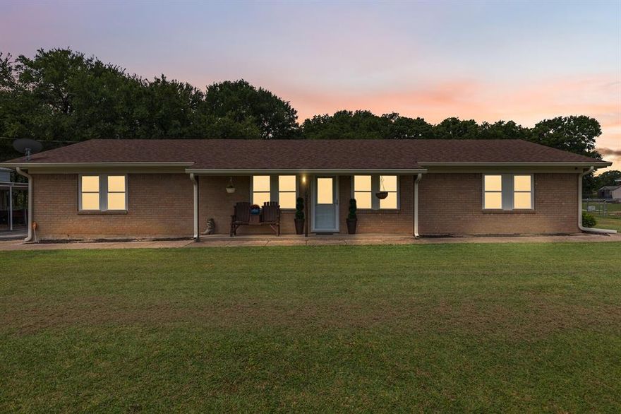 Enjoy country living just minutes from town at this beautifully updated brick home located at 108 Oak Hill Loop in Whitney, TX. Nestled on 1.12 acres with no city taxes, this spacious 4-bedroom, 2-bath home offers 2,272 square feet of comfortable living space in Whitney ISD. Originally built in 1968, the home was extensively remodeled in 2018, including a garage conversion into a generous primary suite, a full kitchen and laundry room renovation, updated appliances, and the addition of a second HVAC system. In 2019, new gutters, trim, and soffits were added, and a new roof was installed in September 2023. Outside, enjoy the large backyard, covered back porch, a two-vehicle carport, and a storage shed for all your extras. There’s also an RV covering with a 30-amp hookup, perfect for guests or travel convenience. With room to roam and modern updates throughout, this property offers the best of both space and function—all outside city limits.