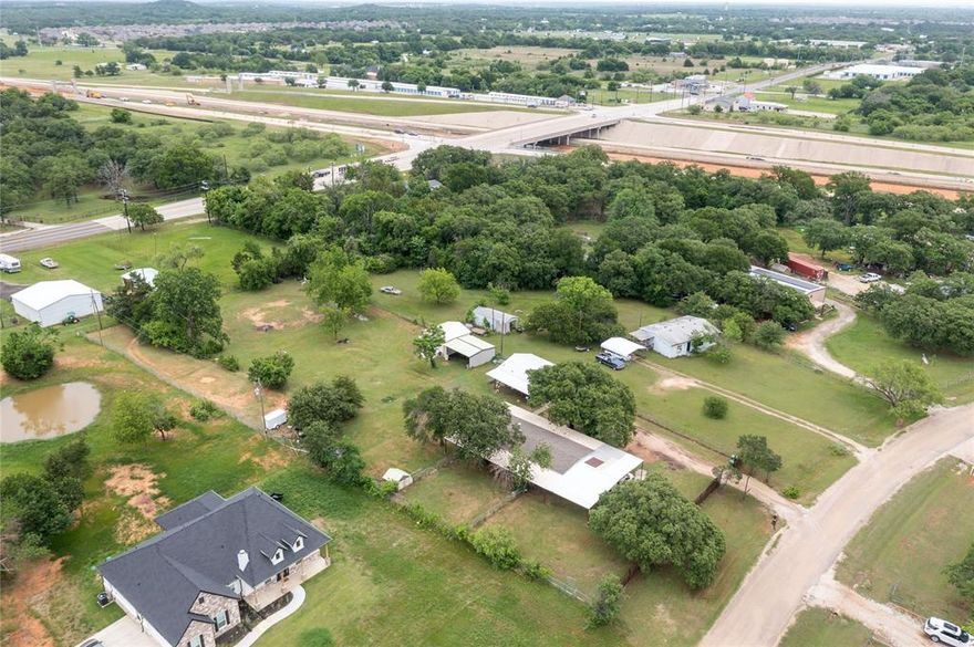 Endless possibilities await, offers two homes on 1.307 acres, in the charming town of Joshua, with quick access to the Chisholm Trail tollway for easy commuting! The main home feature 3 bedrooms and 2 bathrooms,  Rare opportunities like this don't come around often, don miss it!