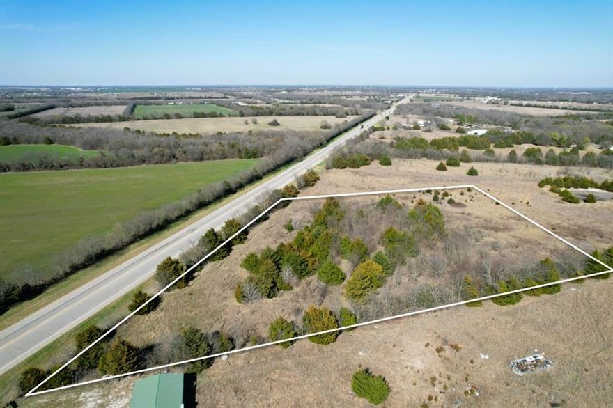 Exceptional 5-acre tract located on Highway 121 in Trenton, Texas, offering approximately 480 feet of highway frontage. This property provides excellent visibility and accessibility in a rapidly growing area. Conveniently situated just 2 minutes from downtown Trenton and approximately 15 minutes from Melissa and U.S. Highway 75, this location offers an ideal balance of rural setting and proximity to major routes and nearby amenities.

The property’s frontage and location present outstanding potential for residential, commercial, or investment use. Buyer and buyer’s agent to verify all information. Go and view the property at your convenience, and contact the listing agent with any questions.