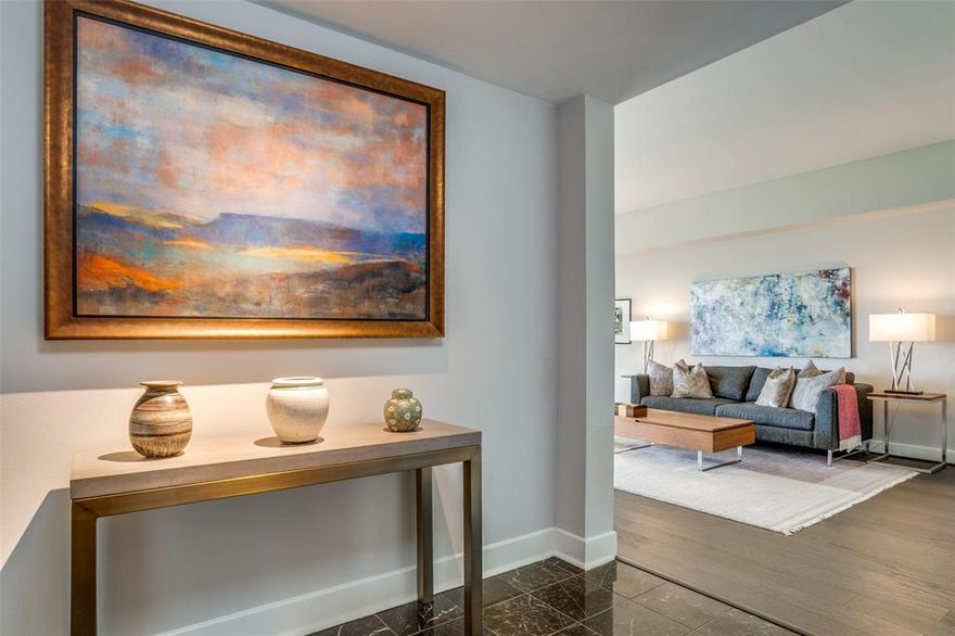 Designed to exceed your expectations, this 20th floor unit at  La Tour offers a rare combination of luxury, thoughtful updates and million-dollar skyline views from every room.
Enjoy a beautifully updated kitchen that opens to the living and dining areas, creating a bright, spacious flow. Sleek, modern cabinetry is complemented by marble countertops, a marble tile backsplash, and stainless-steel sink and appliances. Both bathrooms have been fully remodeled with new cabinetry, plumbing fixtures, countertops, backsplashes, and lighting. The primary suite features serene blue marble tile and elegant diamond-pattern tilework in the shower. Both bedrooms received new carpet in 2025. The unit also includes two deeded garage spaces in a premium first-level location. Floor-to-ceiling picture windows in every room showcase uninterrupted views, adding a dramatic touch to this refined living space—equally stunning by day and night. This is an opportunity to enjoy a move-in-ready, lock-and-leave lifestyle with dining, shopping, and entertainment all around—and the Katy Trail just five minutes away. La Tour offers 24-hour concierge service and every desirable amenity in a premier Uptown location. Highlights for residents include a full fitness center overlooking a beautifully landscaped, resort-style pool with private cabanas, grills, and both tennis and pickleball courts. Additionally, an owner’s lounge with a catering kitchen is available for private events.
Don’t miss this opportunity to live an elevated lifestyle among the peaceful urban surroundings of this one-of-a-kind unit.