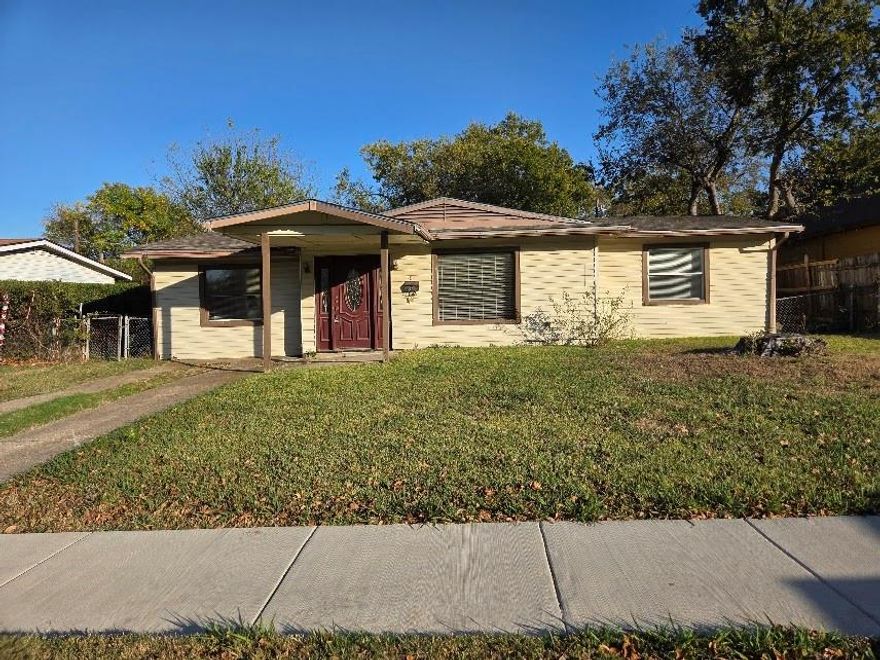 Don't miss out on a prime investment opportunity! This lovely 3 bedroom, 1 bath home features an open floor plan with a spacious backyard! The inviting comfortable layout is sprawling with hardwood floors, upscale lighting and ceiling fans throughout! The living area flows into the kitchen, which features plenty of cabinet space. Step outside to discover a large, fully fenced backyard, perfect for outdoor entertaining, gardening, or simply relaxing under the Texas sky. The ample space is ideal for summer barbecues. Located in a quiet, friendly neighborhood, this home is conveniently close to schools, parks, shopping, and dining. Close to Hypermarkets, and Mesquite Rodeo development. Quick and Easy access to 635 and just 17 minutes away from downtown Dallas. The tax record shows 2 bds. However the garage was converted into a 3rd bedroom with an AC unit installed. A slab of concrete is in the backyard perfect for a shed to sit on.