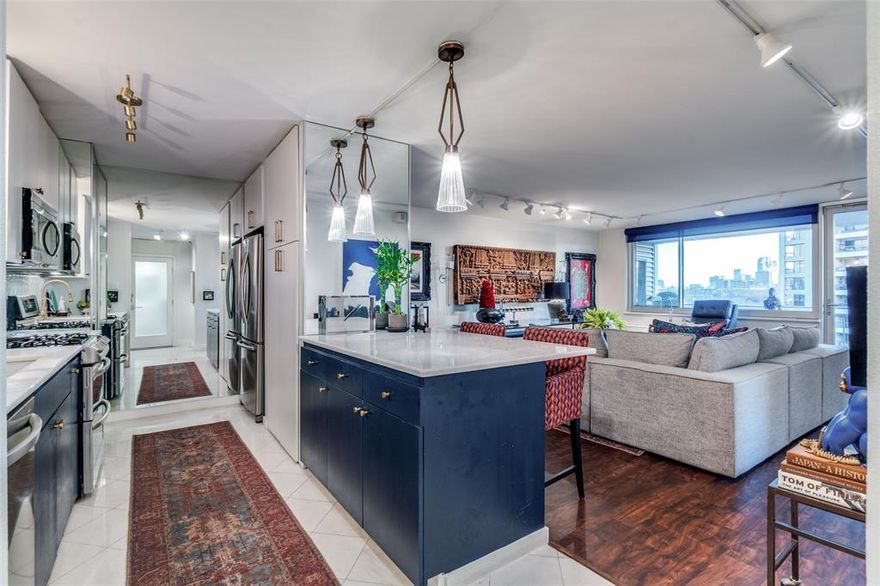 Beautifully remodeled 9th-floor condo in a premium Turtle Creek location with breathtaking downtown skyline and Turtle Creek views. Renovated in 2016 with marble countertops in kitchen and bath, designer fixtures, and a spacious walk-in shower. Luxury vinyl flooring added in 2020. Thoughtfully enhanced by the current owner with architectural, strategically placed custom mirrors along the galley kitchen wall to visually expand and elevate the space. Custom black roller shades in the living area & bedroom. Large bedroom with custom Elfa walk-through closet to bath. Serene views of the resort-style pool and lush grounds. Chef’s kitchen features stainless steel appliances, white farmhouse sink, and satin brass fixtures. A quiet, iconic building setting just minutes from Highland Park Village, Knox District, West Village, premier dining, shopping, major highways, and DFW & Love Field airports. Full-service building with valet, fitness center, pool, spa, clubhouse, dog park, and more. HOA includes electricity, gas, water, and basic cable. Special assessment paid in full by seller.