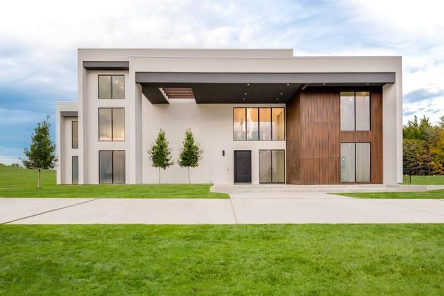 COMING FALL 2024! Welcome to Villa Laman, a stunning Buisier Development project that embodies the perfect blend of elegance and modern luxury living. This contemporary marvel, situated in the prestigious Ridge Lakes of Heath Phase II neighborhood, features a custom design with a motor court driveway offering plenty of space for relaxation and entertainment. The programmable smart home with required shades, and speakers included is fully equipped with a custom Miele kitchen, a remarkable master suite with a spa-like bathroom, four guest bedrooms, spacious lounge areas, a home gym, and a library. The backyard paradise boasts a 1,300 sq. ft. covered patio complete with an outdoor kitchen, a breathtaking pool and spa, and a modern landscape design. Whether hosting guests or spending quality time with family, you’ll find endless hours of enjoyment and entertainment. Welcome home!