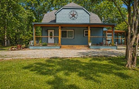 Photo of 1853 Lake Highland W, Quinlan, TX 75474 (MLS # 21244988)