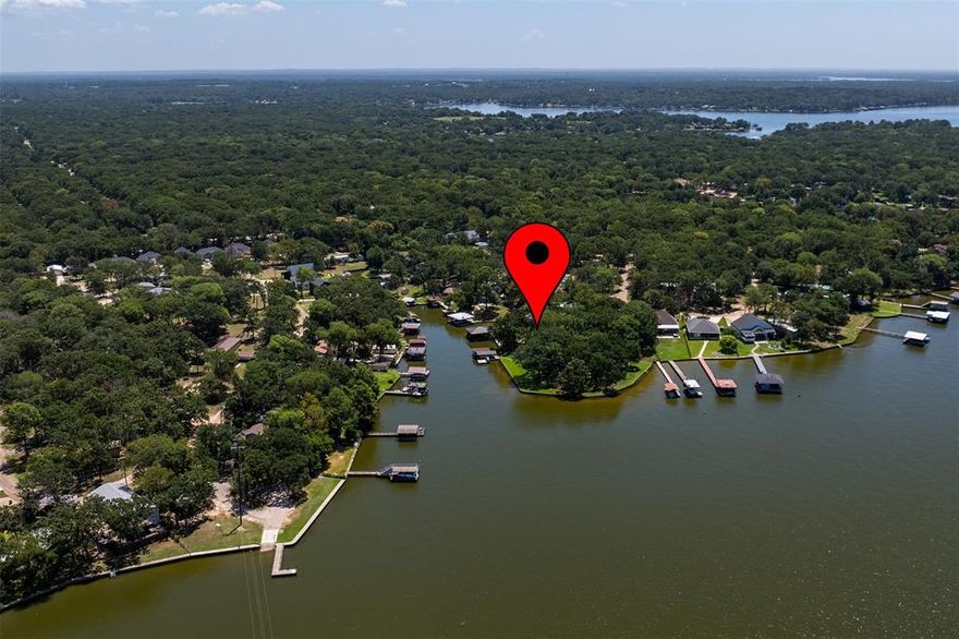 Looking for the perfect getaway? This waterfront lot on Cedar Creek Lake offers everything you need to turn your dreams into reality. Nestled in a quiet cul-de-sac, this peaceful property provides the ideal setting to build your dream cottage, barndominium, or cozy fishing cabin, the possibilities are endless!

With direct lake access, it’s a boater’s and angler’s paradise, perfect for fishing, kayaking, or just relaxing by the water. You'll enjoy the serenity of lake life while being just minutes from town, with restaurants, grocery stores, and shops all within easy reach.

Whether you're looking for a private retreat, a second home, or a short term investment opportunity, this lot has unbeatable potential. Don’t miss your chance to own a slice of lakeside paradise on one of Texas' most popular recreational lakes!