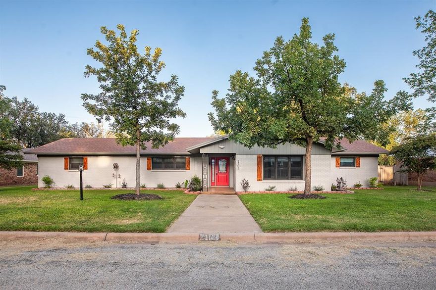 Classy remodel on a lovely street, this beautiful brick home offers spacious living, updated bedrooms and baths, and a custom kitchen with Oak cabinetry throughout. 4 bedrooms, 2 baths, all with wood flooring or tile, new doors, new efficient windows, great lighting, and a family friendly layout. The kitchen has high end stainless steel appliances, gas split range, and multiple seating options. The dining space accommodates multiple options, and a large living area to enjoy for years to come. The double garage, entering through the rear, also offers a nice finished out office or craft room, also vented. This one is ready to move right in and love forever!