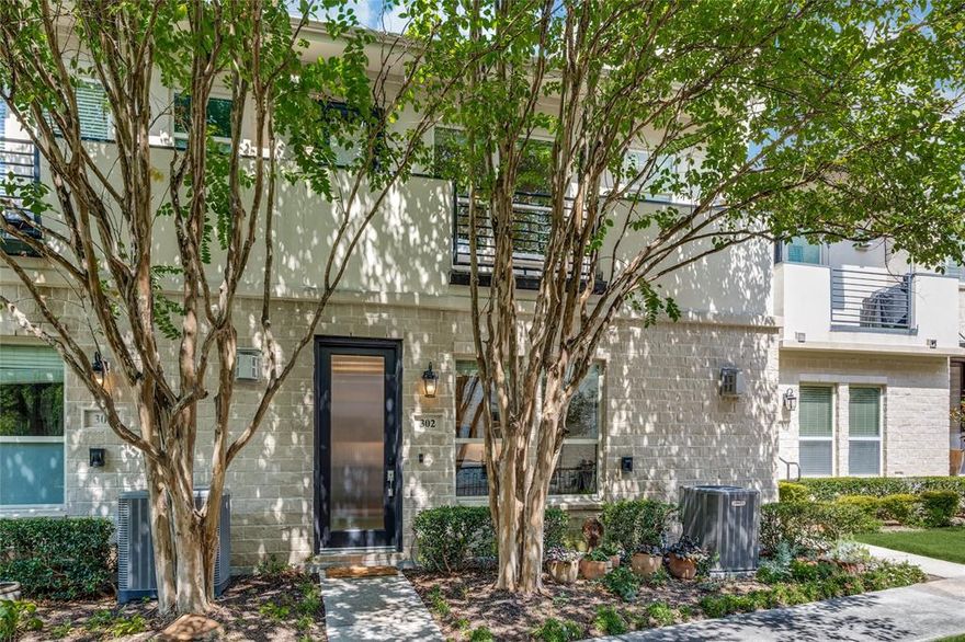 Come and visit one of Dallas's most private and sought-after communities. Unit 302 is a 2-bedroom, 2.1-bath townhome with 1,862 square feet of thoughtfully designed living space. Built in 2009 and meticulously maintained, it delivers the lock-and-leave lifestyle without ever feeling like a compromise. Hardwood floors run throughout the main level. The kitchen was recently remodeled with quartz leather-finish countertops, stainless steel appliances, recessed lighting, and soaring 12-foot ceilings. The open floor plan flows easily from kitchen to living to dining, anchored by a gas log fireplace. Both bedrooms are generous with ensuite baths. The primary suite features an oversized shower, a garden tub, and a large walk-in closet. The second bedroom is finished just as well. Step outside and you have two private outdoor spaces: a patio and a balcony. Below, a 2 car private garage includes a Level 2 EV charger and direct access to the home. Energy efficiency was also built in: tankless water heater and R20 insulation keep utility costs consistently low. HOA covers trash, water, internet, and landscaping. The neighborhood matches the home. Valley View Park and the White Rock Creek Trail are half a mile away, offering miles of jogging, hiking, and cycling. The Clubs of Prestonwood and Bent Tree Country Club are minutes from your door. The Galleria, featuring The Grill on the Alley and Oceanaire Seafood Room, is a five-minute drive. Mercury Grill on Preston Road has been a local fine dining institution for over 25 years. Kenny's Wood Fired Grill in nearby Addison rounds out the dining scene nicely. Private school families will find this location particularly compelling. The Covenant School sits directly on Valley View Ln and most other private schools are minutes away. This is one of the most convenient addresses in Dallas for private school access. This home is the full package: high-end finishes, low-maintenance living, and one of the best locations in Far North Dallas.