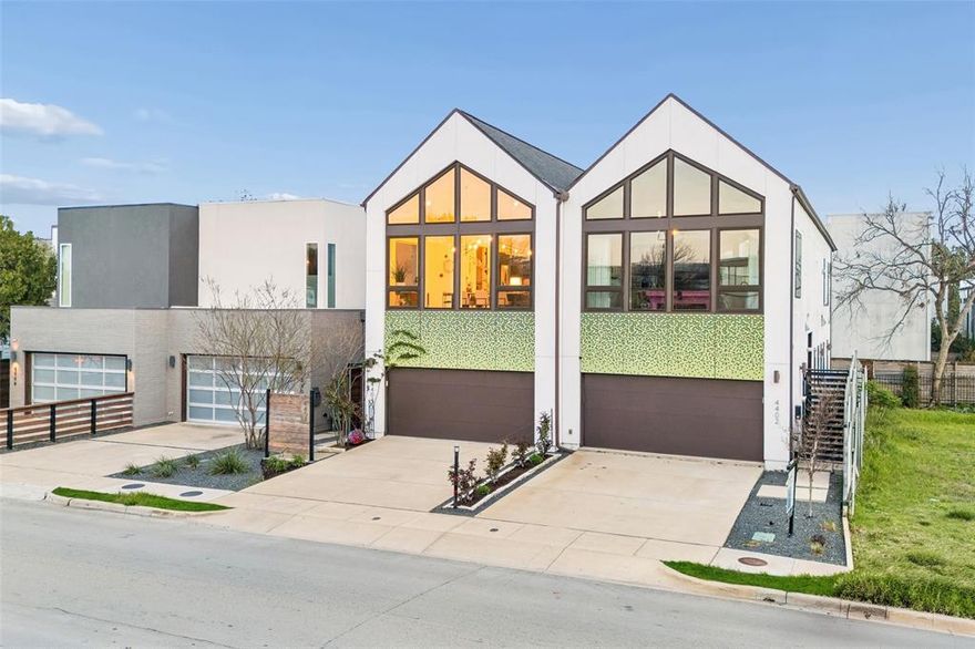 Stunning single-family attached home in the heart of East Uptown just moments from The Central, one of the city’s most transformative new mixed-use developments. Designed for elevated living and sophisticated entertaining, this two story townhome features dramatic soaring ceilings in the main living area, with floor to ceiling windows, genuine hardwood floors, and museum finished walls. The refined look is enhanced by electronic filtered blinds, custom lighting and curated architectural details. The state-of-the-art kitchen anchors the home with a striking Quartz waterfall island, stainless steel appliances, gas range, double ovens, custom wood accents, and sleek contemporary fixtures, blending form and function. The first level features two ample sized bedrooms ideally suited as offices, media or guest rooms and an expansive primary suite which overlooks the private, resort-style pool. The spa-inspired primary bath showcases an open-concept wet room design with a freestanding soaking tub, elevated shower features, and custom motion-activated lighting. Custom closets, a well designed laundry room and a dual HVAC systems provide optimal efficiency and comfort year-round. Impressive outdoor living features a private balcony off the living room which overlooks the custom-built pool and features a slate fireplace - seamless extension of the interior living space. The beautiful heated and chilled pool is finished with opalescent tile and a waterfall feature, delivering year-round enjoyment and a boutique-hotel ambiance rarely found in Uptown townhomes. Additional highlights include an attached two-car garage with epoxy-coated flooring and upgraded storage systems. A rare opportunity to own a one-of-a-kind luxury townhome with private pool in East Uptown, located in a rapidly appreciating neighborhood. Meticulously designed, architecturally striking and no detail overlooked!