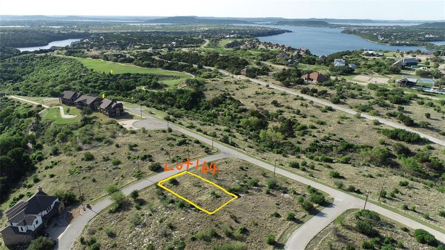 This lot is located near the Birkdale Condos close to the amenities, main gate, and mailboxes. Just a short ATV or golf
 cart ride away to the popular swimming pool, tennis courts, golf course, and Chaparral Grille! This lot is surrounded by
 many of the golf holes of the Cliffs well-known golf course, which is a destination place for avid Texas golfers! As a lot
 owner you will get 36 holes of golf included with your POA dues per year. Sitting slightly elevated you will enjoy
 fabulous views of the hills and valleys surrounding this lot and the enjoy the convenience of its location to PK Lake
 peninsula where many popular shopping and eating spots are found. The Mardi Gras parade, 4th of July firework show
 on July 8th of 2023 and the annual Possum Fest in the early fall is something you will want to attend yearly also! Locals
 are very friendly here as they are used to visitors and newcomers being that PK Lake is a premier Texas destination
 lake. See you here!
