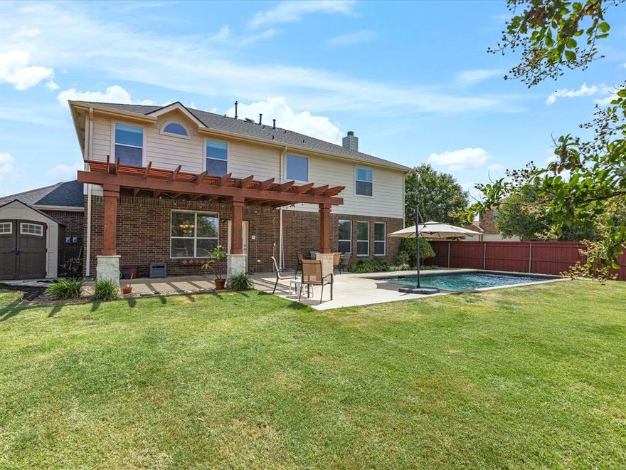 DRASTICALLY REDUCED! PRICED TO SELL! Welcome to your DREAM home with a BACKYARD OASIS! Nestled on an OVERSIZED CORNER LOT that backs to a PEACEFUL GREENBELT AREA BORDERING LEWISVILLE LAKE, this stunning 4-bedroom, 2.5-bath residence offers luxury, privacy, and functionality. The 3-CAR GARAGE provides ample parking and STORAGE WITH A WORKSPACE FOR PROJECTS, while the backyard is your personal oasis complete with a SPARKLING POOL and a charming pergola perfect for OUTDOOR ENTERTAINING.
Inside, you'll find a spacious and inviting layout with a dedicated study featuring custom built-in bookshelves, ideal for working from home. The primary suite is a true retreat with recently updated granite countertops and fixtures, in addition, a modern bidet toilet. Enjoy cooking in the oversized kitchen with a central island, butler’s pantry, and generous cabinetry. The laundry room includes built-in cabinets and space for a secondary fridge or freezer. A spectacular coat and backpack rack upon entering from the garage. UPSTAIRS, AN EXPANSIVE GAME ROOM provides a versatile second living area perfect for MOVIE NIGHTS, a playroom, or even a HOME GYM. Recent upgraded waterproof laminate flooring in primary bedroom, game room, dining room, entry way and upstairs landing. Additional highlights include a NEW ROOF INSTALLED IN FEBRUARY 2025 and thoughtful upgrades throughout. Only a SHORT WALK to LITTLE ELM HIGH SCHOOL and LAKEVIEW ELEMENTARY. This is more than just a home, it’s a lifestyle. Don’t miss your opportunity to own this rare gem!  See Seller Upgrade and Updates list in the supplements.