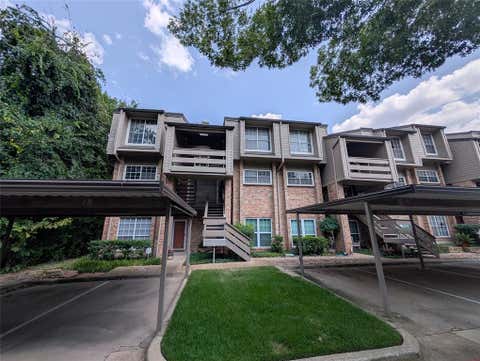 Photo of 9801 Royal Lane #311, Dallas, TX 75231 (MLS # 21351623)