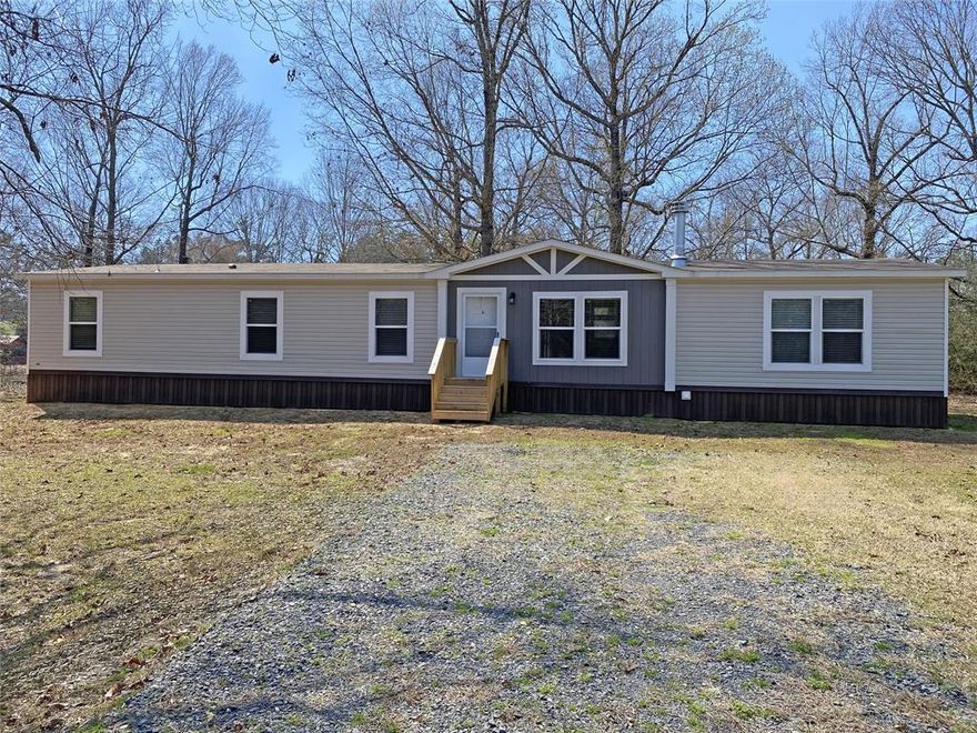 This never-been-lived-in manufactured home offers comfortable living with a practical layout designed for everyday convenience and relaxation. Built in 2024 offering the advantages of modern building standards and contemporary design elements. The fresh construction means everything is brand new, from the structural components to the finishing touches throughout the property. With five bedrooms and three full baths, this home provides ample space for comfortable living. The thoughtful design maximizes the available space while maintaining functionality across all areas of the residence. The recent construction date ensures that all systems and components meet current building codes and standards. This translates to peace of mind for homeowners, knowing that the property incorporates the latest construction techniques and materials available in today's market. Schedule your private showing today and discover the comfort and convenience this beautiful home has to offer.