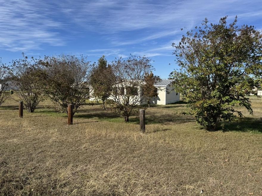 Get out of the hustle and bustle.  Your beautiful country home awaits with room to roam.  Peaceful and quiet.  Big front porch to relax on.  Carport with  storage building.