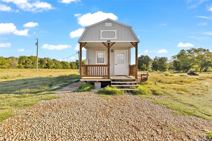 Discover peaceful country living just minutes from town! This beautiful 7.7-acre property offers the perfect blend of open space and convenience. Nestled off FM 2874, the land features a cozy tiny home with full utilities already in place—ideal as a weekend getaway, guest house, or temporary living space while you build your dream home.The acreage provides plenty of room for livestock, gardening, recreation, or future expansion. With a mix of cleared land and natural surroundings, you’ll enjoy privacy and endless possibilities for customization. Utilities—including water, electric, and septic—are already connected, saving you time and cost on development. Located just off TX-224, this property offers easy access to Greenville amenities while maintaining a quiet rural atmosphere. Whether you're seeking a homestead, investment, or a peaceful retreat, this property is ready for your vision.
