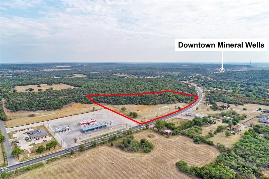 TIRZ funding and City incentives may be available—contact the listing agent for details.

Now offering an exceptional 8.402-acre prime commercial tract, ideally located adjacent to the new Allsup’s, just 1.3 miles west of Historic Downtown Mineral Wells and along the route to Possum Kingdom Lake. An additional ±5 acres of contiguous commercial land is also available, allowing buyers the opportunity to expand or customize a larger development footprint.

This highly visible property boasts approximately 1,000 feet of highway frontage and is well-suited for a variety of uses, including a medical facility, strip center, residential development, or short-term rental project. It is minutes from downtown Mineral Wells, home to the iconic Crazy Water Hotel and a growing mix of shopping, dining, and entertainment.

Conveniently located near the City Park, aquatic center, sports complexes, medical district, and county hospital, with multiple established neighborhoods nearby, this site offers outstanding exposure, accessibility, and development potential.

All information is deemed reliable but not guaranteed and should be independently verified by the buyer.