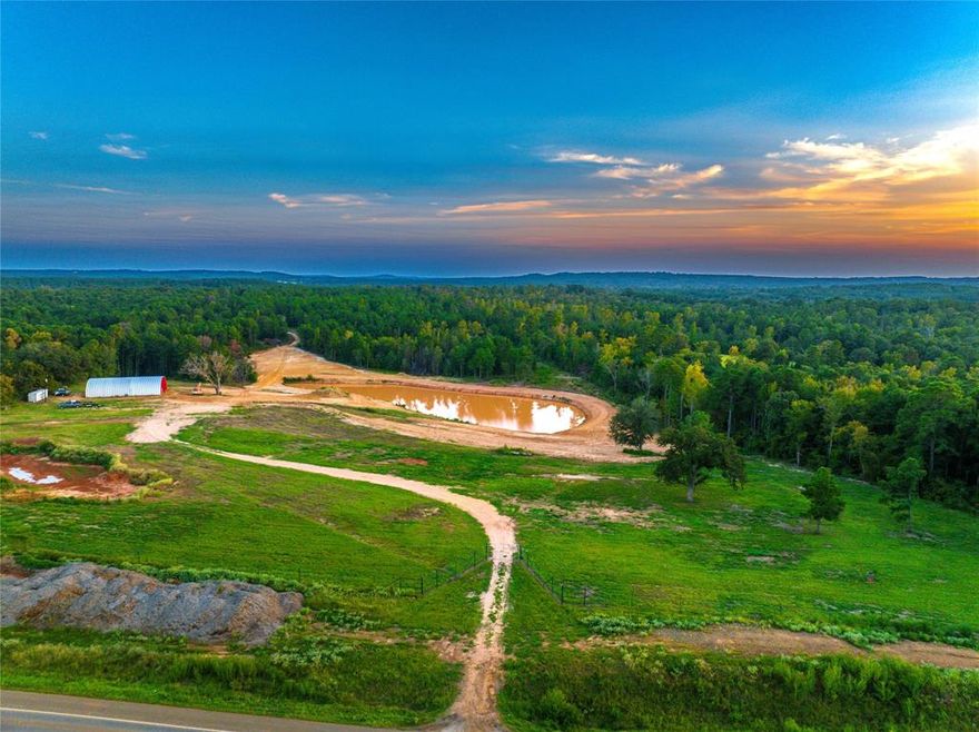 Boren Ranch, located in scenic northwestern Cherokee County, offers 375± acres of diverse landscapes, blending pine plantation and mature hardwood bottoms. With 1,014 feet of road frontage on State Highway 175, this prime property is just 10 minutes from Jacksonville and provides convenient access to Tyler, Athens, Palestine, and the DFW Metroplex. The gated entrance features a Quonset-style barn and a peaceful 2-acre pond. A cleared front section allows for development, agricultural use, or recreation. The ranch includes a trail system, pine timber, hardwood bottoms, and a live-water creek with deep banks. With 120 feet of elevation change, Boren Ranch’s versatile terrain is ideal for timber investment, recreation, or development. This rare offering is perfect for those seeking a private retreat, agricultural venture, or a thoughtful project. Contact us today to schedule a tour and explore the endless possibilities at Boren Ranch.