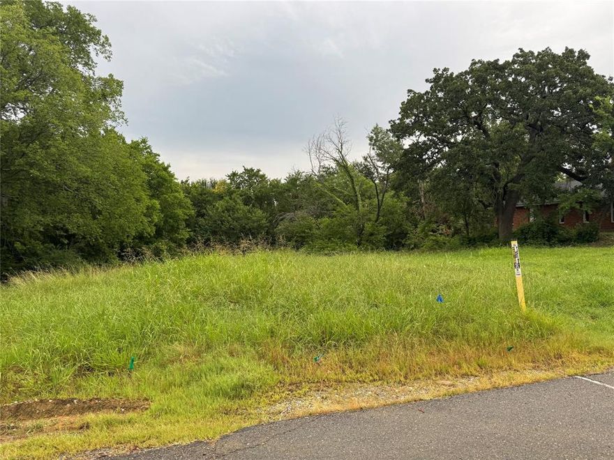 Welcome to 509 E Shepherd Street in Denison, Texas, a prime .178-acre homesite offering a rare opportunity to build your dream home in a well-established neighborhood just minutes from vibrant downtown Denison. This level and mostly cleared lot provides the ideal foundation for new construction with utilities available at the street and no HOA restrictions, allowing for design flexibility and creative freedom.
Nestled on a quiet street lined with mature trees and classic Texas charm, the property offers peaceful surroundings while remaining close to shopping, dining, schools, and local events. Whether you're building your primary residence or investing in the area's growth, this property is an excellent fit for those seeking a balance between community connection and outdoor adventure.
One of the standout features of this location is its close proximity to Lake Texoma, located just 10 miles away. Known as one of the largest and most popular lakes in the region, Lake Texoma offers over 89,000 acres of open water, more than 1,000 miles of shoreline, and countless recreational opportunities. Residents enjoy easy access to boating, fishing, paddleboarding, and lakeside picnics. The nearby Eisenhower State Park provides scenic hiking trails, campgrounds, and panoramic lake views, making it a favorite destination for weekend outings and nature lovers.
In addition to Lake Texoma, this property is conveniently situated near several local parks including Munson Park and Forest Park, offering playgrounds, open green spaces, and sports facilities that add to the appeal of everyday living in Denison. The neighborhood is part of the growing Texoma region, which continues to attract new development, cultural attractions, and community initiatives.
With its blend of peaceful residential setting and close proximity to outdoor recreation, 509 E Shepherd Street is a compelling option for buyers looking to enjoy both small-town warmth and the adventure of lakeside living.