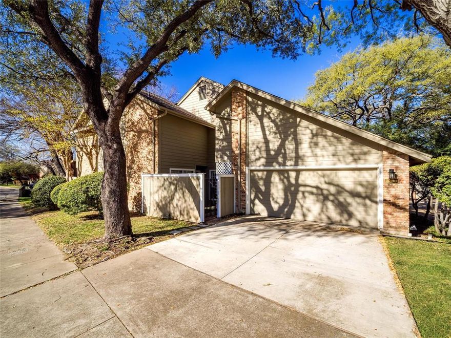 Located in the heart of Lake Highlands, this updated 3 Bed, 3 Bath home offers the ideal combination of privacy, functionality, and convenience in one of Dallas’ most established and sought-after areas. Backing to a peaceful greenspace filled with mature trees, the oversized private patio and deck create an outdoor setting that feels tucked away while still being minutes from everything. Inside, the open floorplan is filled with natural light and features vaulted ceilings, a spacious living area with a fireplace, and a custom built-in cabinet and wet bar designed for entertaining. The layout flows effortlessly between the living, dining, and kitchen spaces, making the home feel both comfortable and functional for everyday living. One of the secondary bedrooms features extensive built-in shelving and abundant natural light, creating the perfect flex space for a home office, study, or creative workspace. Ample storage throughout the home adds to the practicality rarely found at this size and price point. Upstairs the primary suite overlooks the greenbelt & creek and the other bedroom offers a large soaking tub. The primary suite offers tons of natural light, large bathroom, and walk in closet. Positioned within highly rated Lake Highlands ISD and just seconds from Lake Highlands Town Center, enjoy quick access to shopping, dining, entertainment, and everyday conveniences including Sprouts Farmers Market, Mi Cocina, and numerous new developments transforming the area. The home is also conveniently located near White Rock Lake and Dallas Arboretum and Botanical Garden, offering easy access to some of Dallas’ best outdoor amenities including walking and biking trails, kayaking, running paths, parks, and year-round outdoor recreation. With major highways nearby, commuting anywhere in Dallas is simple. This is an opportunity to own a low-maintenance home with outdoor privacy, strong location appeal, and a highly functional layout in the center of Lake Highlands.
