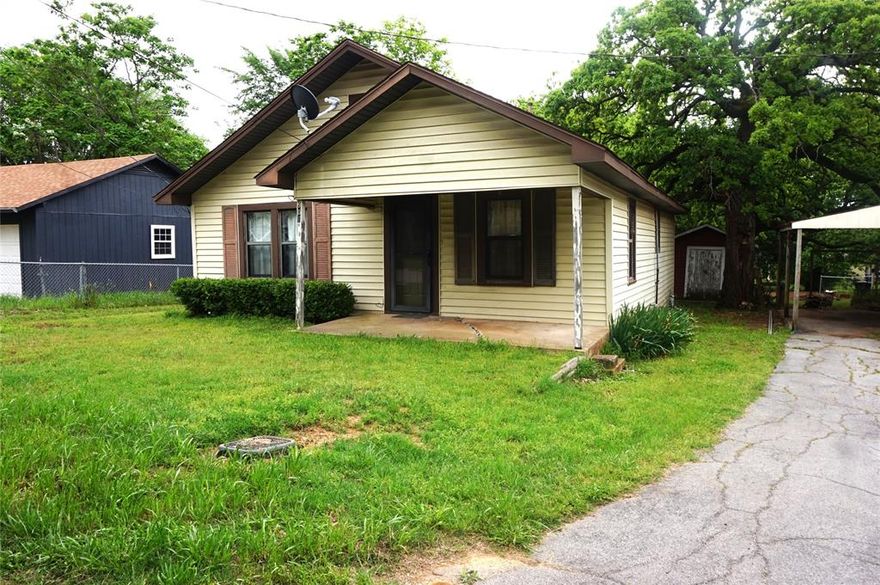 MULTIPLE OFFERS SUBMITTED:  PLEASE SUBMIT ALL OFFERS BY MONDAY, MAY 5TH BY 5:00 PM.  This Cutie is Priced Right! Large, oversized rooms, big country, eat-in kitchen, a deck off the back door, carport and a MAN CAVE or SHE SHED in the large grassy back yard. Seller says there are Wood Floors under the Carpet.  At this price, you can afford to make it your own.