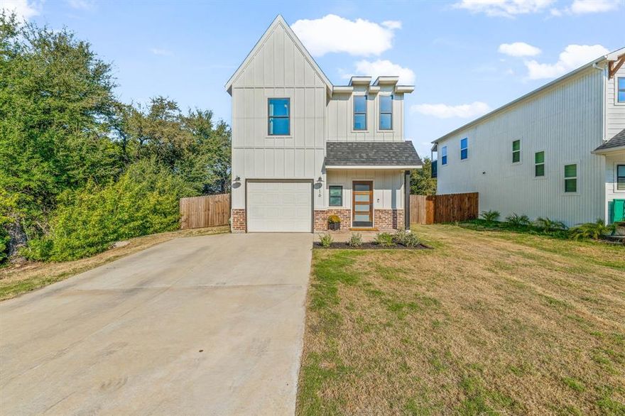 Welcome to this stunning modern farmhouse in the heart of Granbury! Built in 2022, this beautifully designed 3-bedroom, 2.5-bath home blends comfort, character, and contemporary style — all for under $300K!

Step inside to an open-concept layout featuring a designer kitchen with quartz countertops, a farmhouse sink, custom cabinetry, a large island, open shelving, and herringbone tile backsplash. The spacious living area includes luxury vinyl plank flooring, an electric fireplace, and tons of natural light, creating a perfect space for entertaining or relaxing.

Upstairs, you’ll find three spacious bedrooms, including a private primary suite with a custom closet system and a spa-like ensuite featuring dual sinks and a walk-in shower. The laundry room offers additional storage, built-in cabinetry, and a stylish checkered floor.

Enjoy your fenced backyard with space for entertaining, pets, or playtime — ideal for Texas evenings under the stars. Located in Comanche Cove, you’ll have access to community amenities and be just minutes from Lake Granbury, shopping, and dining.