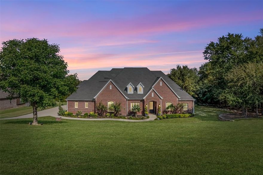 Listed under appraised value for immediate built-in equity. Located in the highly desirable Aledo ISD, this custom-built home offers the perfect blend of craftsmanship, luxury, and comfort. From the moment you enter, you’ll be welcomed by beautiful trim work, oversized interior doors, and an abundance of natural light that enhance the home’s open design.

The chef’s kitchen is a true centerpiece, featuring high-end appliances, custom cabinetry, generous counter space, and a thoughtful layout that makes it ideal for the culinary enthusiast. Whether hosting large gatherings or enjoying everyday meals, the kitchen and adjoining living areas are designed for seamless entertaining.

With ample storage throughout, the home is as practical as it is elegant. Every detail has been carefully considered, from the smart floor plan to the high-quality finishes.

Step outside to the private backyard retreat, where wooded areas border two sides of the property, creating a peaceful setting and a perfect spot to enjoy stunning sunsets. Nestled within a gated community with a low HOA annual fee, this home offers both security and convenience while maintaining a relaxed, welcoming atmosphere.

This is a rare opportunity to own a truly exceptional property in one of Texas’ highly sought-after communities.