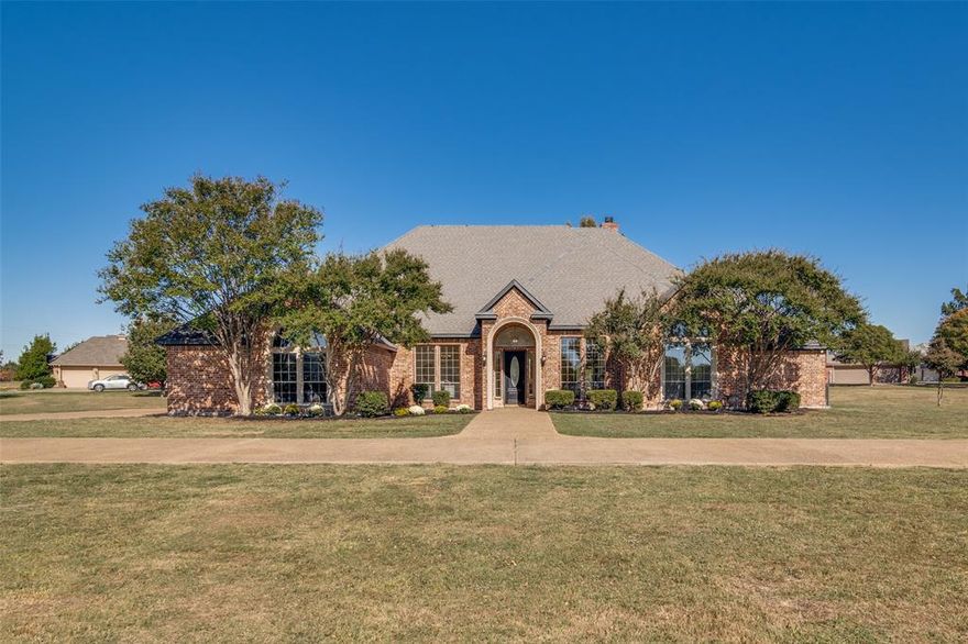 Prepare to be captivated by this stunning, generously sized home that seamlessly blends sprawling acreage with unparalleled, brand-new luxury. Located in highly desirable Rockwall, this 3,547 sq. ft. executive residence sits on a private 1.6-acre lot, offering the space, serenity, and top-to-bottom upgrades you've been searching for. Inside, you’ll find an abundance of natural light, highlighting the new oak hardwood floors, fresh carpet, and crisp, modern paint throughout.

The gorgeous kitchen has been completely refreshed with quartz countertops, new stainless steel appliances, and sleek finishes, making it both functional and stylish. Entertain with ease at the new bar area, or unwind in the open living spaces filled with warm light and comfort.

Every detail has been thoughtfully updated, including LED lighting, new septic equipment, and a smart sprinkler system for effortless outdoor maintenance. The epoxy flake garage floor adds a finishing touch of durability and polish.

With its corner-lot privacy, modern updates, and bright, open feel, this home offers the ideal combination of move-in-ready comfort and peaceful, spacious living.