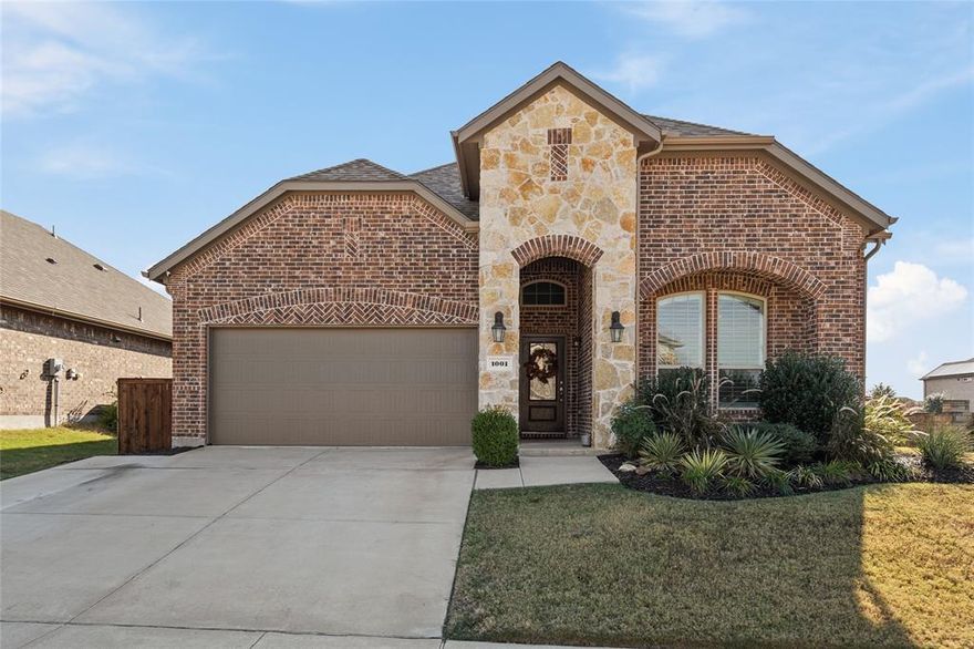 Move-In Ready Home in Prime Celina Location — This beautifully maintained 4-bedroom, 4-bathroom home offers the perfect blend of luxury, comfort, and functionality. Situated on a corner lot in a highly sought-after community with quick access to the Outer Loop, it provides exceptional living spaces both inside and out. The open-concept design showcases a welcoming living room with a cozy fireplace that flows seamlessly into the bright breakfast nook and gourmet kitchen—complete with stainless steel appliances, refrigerator, a gas cooktop, granite countertops, and a center island. Also, a dryer and a washing machine are provided in the laundry room. All bedrooms are conveniently located on the first floor, including the elegant primary suite with French doors, a spa-like ensuite bath featuring dual vanities, a soaking tub, a separate shower, a private water closet, and a spacious walk-in closet. Upstairs, a versatile loft with a full bathroom offers endless possibilities—perfect for a game room, playroom, media area, or guest retreat. Outdoor living is enhanced by the extended covered porch, expansive backyard, upgraded Class 3 roof, and extended driveway. Additional upgrades, such as custom wood shutters throughout and plank tile flooring, further elevate the home’s appeal. Residents will also enjoy walking distance to the community pool, elementary school, Collin College campus, multiple parks, and playgrounds. Less than 4 miles to H-E-B or Kroger, and less than 2 miles away from the upcoming Walmart scheduled to open in 2026. This exceptional home combines style, convenience, and an unbeatable opportunity in one of Celina’s most desirable communities.