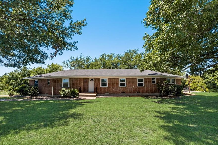 **APPLICATION PENDING** This fantastic country living property is fully updated & is situated on a huge 3 acre plot with plenty of space out front to enjoy some time outside! Almost the whole property is covered with huge shade trees! Upon entering you are greeted with the formal living & dining areas. There is an additional living area that is open to the kitchen as well, which features a fireplace (cosmetic only, not for use) with 2 large glass sliding doors on each side which let in a ton of natural light! Kitchen is equipped with stainless steel apps, granite counters & plenty of cabinets. Property also features plenty of space on the outdoor patio, a huge semi-circle drive & a large barn for storage.  Bring your chickens (no livestock though)!  Lawn care is even included on this one!  Renters insurance is required.  Don't miss out on this amazing opportunity!