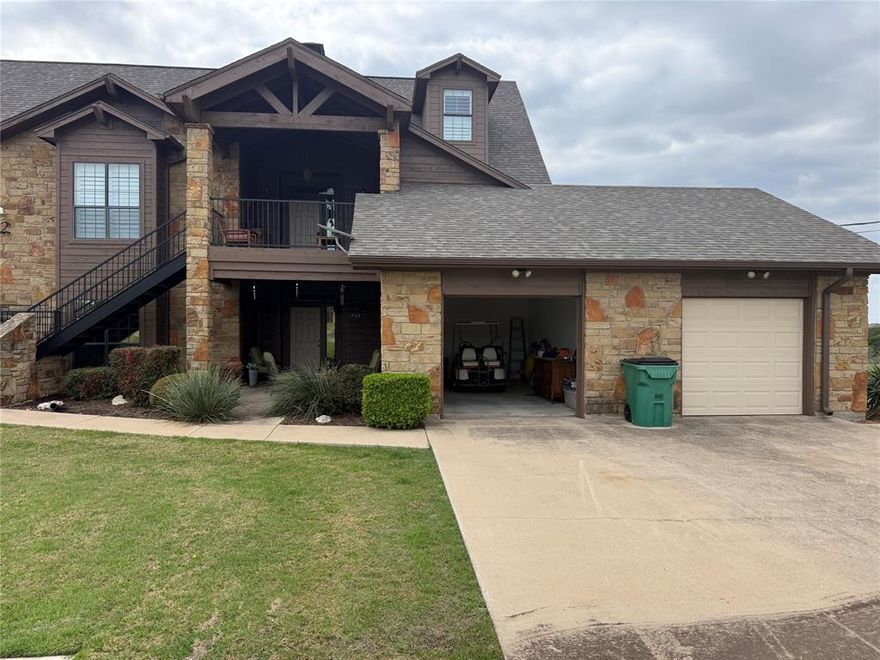 Very nice downstairs two bedroom unit. Single Car Garage. Just off the #11 Tee Box on the Golf Course. Open concept unit with living dining and kitchen. Fireplace in the living area. Open the windows and enjoy the scenic views of the golf course and rolling hillside. Make fun of me when you see me teeing off on hole #11. Tastefully decorated for the perfect lake condo. Enjoy all of The Cliffs amenities. Restaurant, Spa, pool, Marina, Beach Area, Private Roads. This is a wonderful golfing community. The Cliffs marina is one of the finest marinas on the lake. Easy slope launch ramp. Kitchen over looks the dining and living areas and can see through the windows out to the golf course. Very nice covered course side patio. Enjoy the daily breeze. Wonderful area for eating outside.
