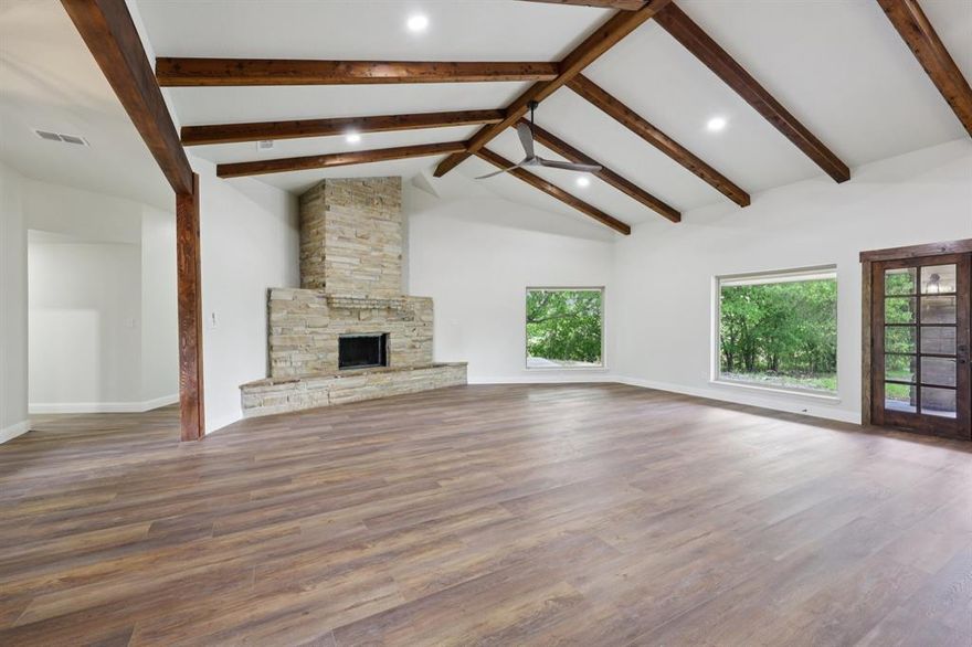 Just WOW! You have got to see this completely remodeled, truly one-of-a-kind home that blends luxury, style, and functionality in every detail. From the moment you walk in, you’ll be captivated by the expansive living area, open dining space, and a hidden “secret door” leading to a versatile flex room—perfect for a media room, game room, or private retreat. PLUS the seller is giving the buyer up to $25k to help with closing costs. 

The home showcases a rich and elegant design with a stunning dark green & copper color palette carried thoughtfully throughout. No detail was overlooked in the renovation, featuring high-end appliances, all-new windows & doors, and quality upgrades that make the entire home feel brand new. Huge windows throughout flood the home with natural light, creating a bright and inviting atmosphere in every room.

Situated on a rare 1.2-acre lot in the heart of the DFW metroplex, this property offers the perfect balance of privacy & convenience within an exclusive gated community of just 17 custom homes. Enjoy peaceful estate-style living while being minutes from top rated schools, premier shopping, dining, & major highways.

Designed for both relaxation and entertaining, the home features large covered patios on three sides, along with a beautiful courtyard that creates a true outdoor oasis. A privacy fence around the backyard adds even more seclusion and usability to the outdoor space. Inside, you’ll find 2 living areas, 2 dining spaces, along with a huge pantry and a luxurious spa-like primary suite complete with a massive walk-in closet.

The property also includes a 3-car garage, with 1 bay set apart from the others, making it an ideal space for a workshop, hobby area, or additional storage. The fireplace is wood-burning but already has gas lines installed—simply add a propane tank to easily convert it if desired.

This is more than a home—it’s a statement. Don’t miss your opportunity to own this exquisite property. WELCOME HOME!