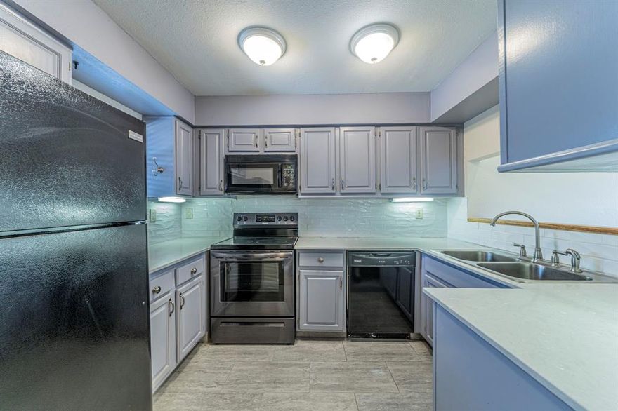 Perfect 2 bed, 2 bath Lock & Leave condo in a great N. Arlington location. Light and bright living room overlooks the sparkling community pool. Enjoy your morning coffee or evening glass of wine on the private rear patio. This unit is very spacious and will provide easy living for it's new owner. The kitchen has quartz counters, subway tile backsplash and stainless & black appliances. And the fridge gets to stay! Just across the street on Green Oaks is River Legacy Park for all outdoor adventurers and you will also be in close proximity to the entertainment district and shopping. This unit is perfect to be owner occupied but would also make a good rental property.