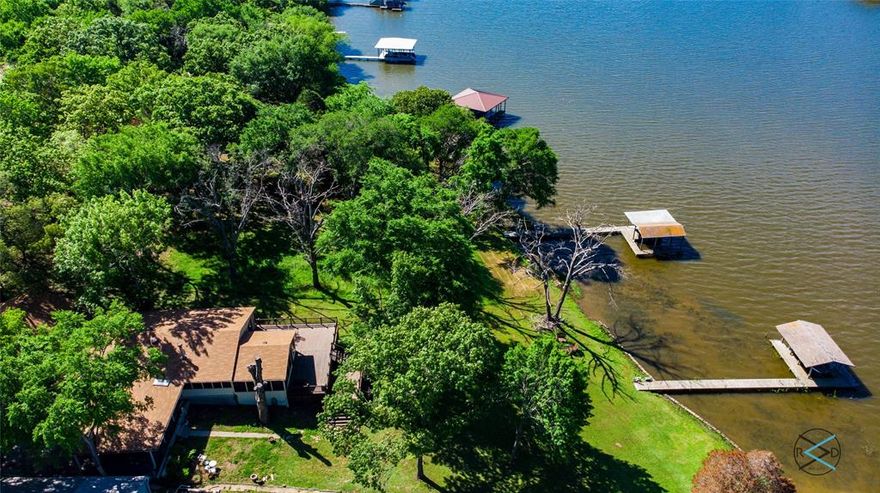 Introducing this charming 1,341 square-foot lakefront retreat on the serene shores of Cedar Creek Lake.  Nestled in a peaceful and picturesque setting, this property is a true gem for those seeking the perfect blend of relaxation and recreation.