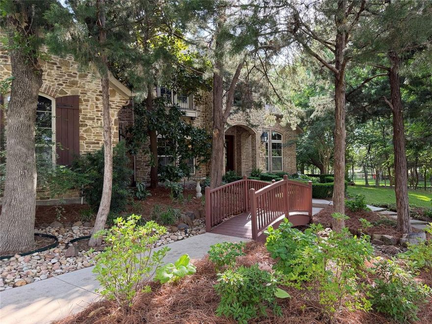 Stately Home Rests on a .86 Acre Wooded Lot in Prestigious Wyndemere. Wide Foyer with Curved Staircase Leading You Past an Elegant Dining and Handsome Home Office with Rich Wood Cabinetry and French Doors. The Living Room Makes a Striking Impression with Floor-to-Ceiling Gas Burning Fireplace and a Wall of Windows Offering Stunning Views of Your Private Outdoor Living. The Magic Continues Outdoors Where Flagstone and Crushed Granite Pathways Wind Through Towering Trees to a Circular Stone Firepit and an Expansive Deck. For the Home Chef the Gourmet Kitchen Features Classic Copper Farm Sink, Magnificent Center Island with Vegetable Sink, High-End Capital Double Ovens with a Six Burner Range and Griddle. Recent Upgrades Include an Incredible Bosch Dishwasher. Retreat to the Gracious Primary Suite Which Boasts a Spacious Sitting Area and Private Access to the Second Patio and Backyard Pathways. Ensuite Bath Is Pure Luxury Highlighted by a Freestanding Copper Tub and an Oversized Walk-In Shower. Entertainment is Effortless in the Stylish Media Room Complete with Its Own Refreshment Bar and Mini-Fridge. Throughout the Home, You’ll Find Elegant Finishes Like Extensive Harwood Flooring and Plantation Shutters. Two HVAC Units Replaced in 2025 and 2025 Foundation Work Backed by a Transferable Warranty. With Substantial Secondary Bedrooms and Three Car Garage, Every Corner of this Home Reflects Craftsmanship, Comfort, and Style Offering the Ultimate Heath Lifestyle.