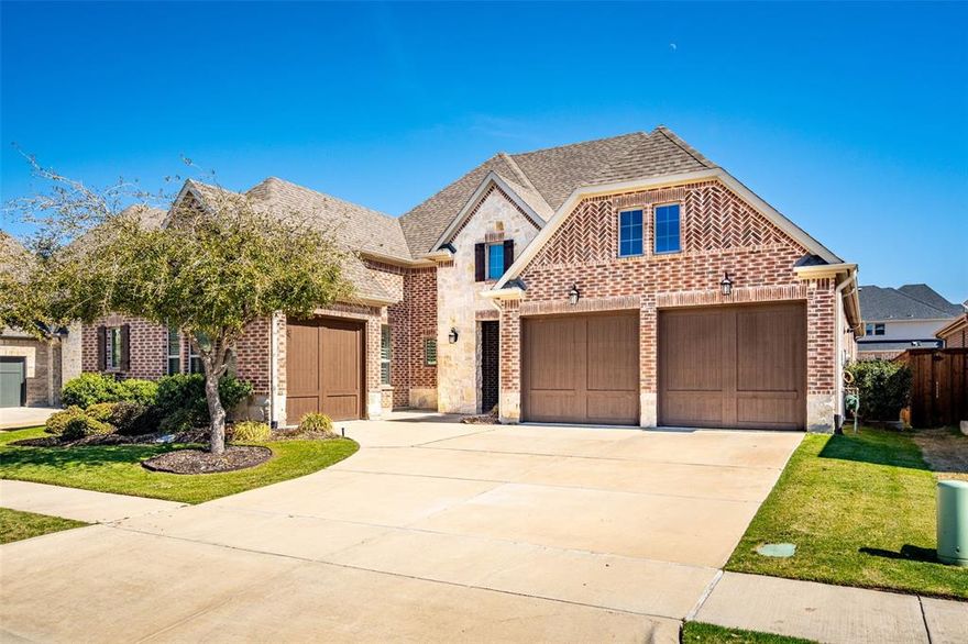 Gorgeous one story home in The Tribute Lakeside Golf & Resort Community! Statement entryway into four bedrooms or three plus large office with huge closet, 3.5 bathrooms, three car garage perfect for your golf cart or even home gym. High end features throughout this spacious floorplan with plantation shutters, high ceilings, hardwood floors no carpet, oversized island great for entertaining, wine fridge. Two guest bedrooms each have en suite bathrooms. Home backs up to the greenbelt with large covered patio that already has gas line. Residents of the Waterford Point village have their own exclusive clubhouse with gym, yoga & spin studio, social events, infinity pool overlooking Lake Lewisville. 
Experience the tranquility and joy of lakeside living in this exceptional property! Enjoy 13+ miles of nature trails along Lake Lewisville! Ideally located by Prestwick Stem Academy Elementary School & Strike Middle School w athletic facilities: football field, track, tennis courts, etc. Amenities include multiple resort style community pools, children’s splash park, playgrounds, dog parks, fishing throughout the ponds, neighborhood events & Two Award-Winning Golf Courses w bar & restaurants. Marina started construction in the neighborhood w beach volleyball & waterfront area for events!