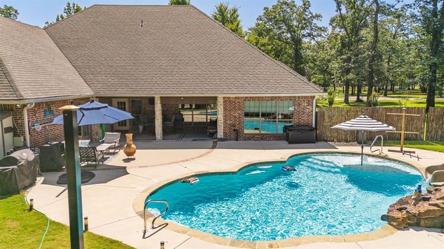 Tired of feeling cramped in your current space? Come stretch out on this glorious 2-acre estate where room sizes are measured in Wow! not square feet. From the soaring vaulted ceilings that practically demand a echoing competition, to the open-concept layout that flows, this custom home was made for living and impressing.The primary bedroom? It’s not just a bedroom — it’s a sanctuary. A grand space complete with a closet so spacious, you might briefly forget where you are and emerge days later with a scarf you thought you lost in 2017. And the bonus room overlooking the pool? It’s ready to moonlight as a home gym, an office, or the world’s most charming guest suite — complete with a Murphy bed that pops down like a magician’s trick. Now let’s talk backyard. Your own personal oasis includes a sparkling 19x35 pool with poles ready for removable sunshades — because nothing says luxury like controlling your own UV exposure. A large covered patio begs for barbecues, book clubs, or quiet moments where you gaze into the distance and think, I really nailed this real estate decision. And yes, your kingdom extends beyond the fenced area to a picturesque creek, where you're welcome to have a burn pile, set up deer feeders, or simply ponder nature like. As for storage and hobbies: you've got a 3-car garage with a tool room AND a 16x20 metal shop with a concrete floor — perfect for tools, toys, or that DIY project you’ve been pretending you’re going to finish.  And above the garage? A 22x10 bonus room just waiting to become whatever you want it to be — art studio, man cave, zen den, vintage typewriter museum... you dream it, it fits. So grab your swimsuit, your Pinterest boards, and your love for elbow room — and come fall in love with a home that has space for your lifestyle and your wildest whims.